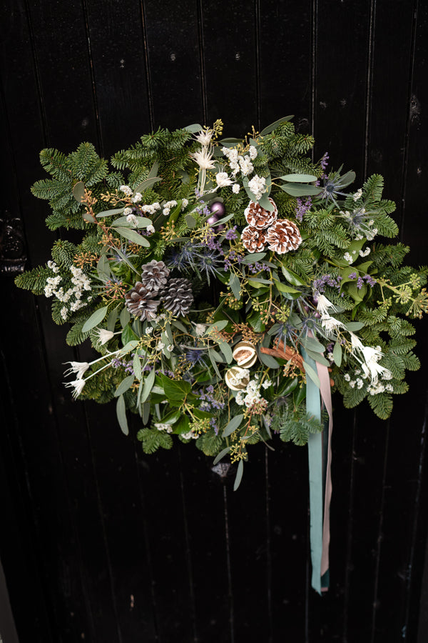 Winter frosted door wreath